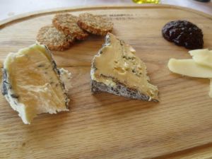 A selection of local cheeses with oatmeal cookies